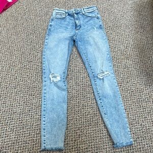 Blue distressed jeans